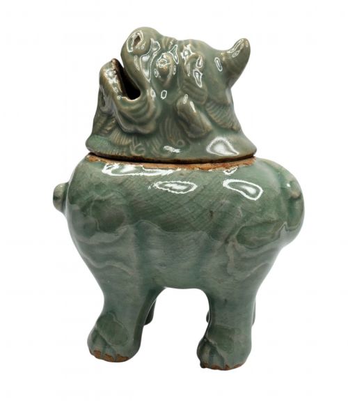 fig 3. A celadon-glazed ceramic incense burner formed as a quadruped mythical creature with a removable head serving as the lid.