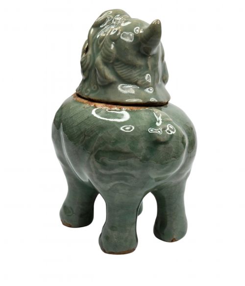 fig 4. A celadon-glazed ceramic incense burner formed as a quadruped mythical creature with a removable head serving as the lid.