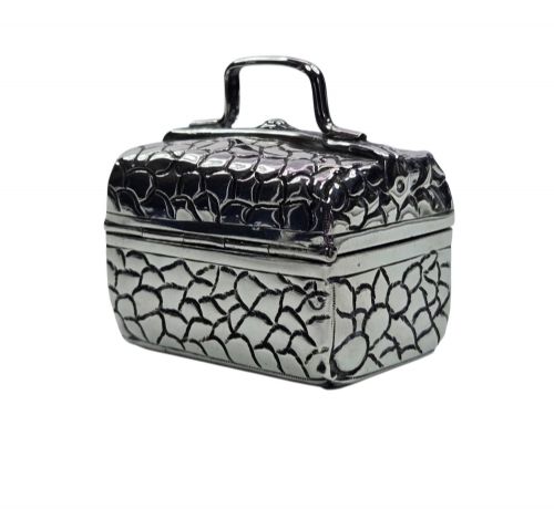 fig 2. A late Victorian sterling silver novelty box crafted in the form of a miniature trunk with embossed crocodile skin texture and a top carrying handle.