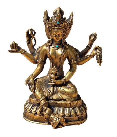 fig 3. An early 19th-century gilt bronze multi-armed deity figure seated on a lotus base with turquoise stone inlays in the crown.