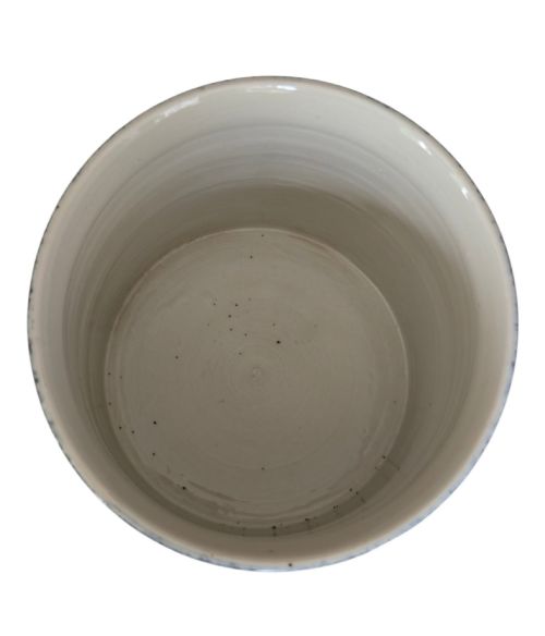 fig 4. A cylindrical Chinese porcelain brush pot featuring a mottled powder-blue glaze with a pale rim.