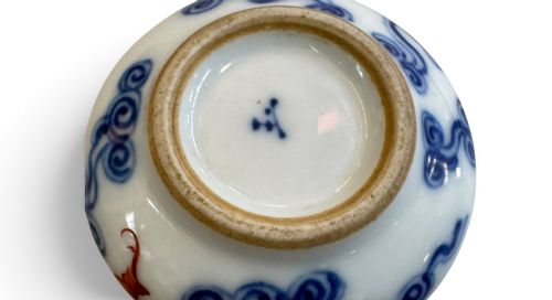 fig 2. A squatted Chinese porcelain brush washer decorated with underglaze cobalt blue clouds and copper red bats on a white glazed ground.