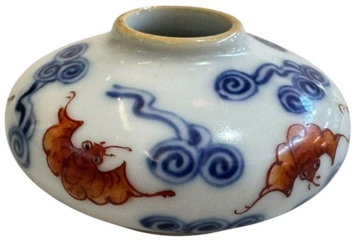fig 3. A squatted Chinese porcelain brush washer decorated with underglaze cobalt blue clouds and copper red bats on a white glazed ground.