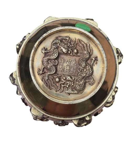 fig 1. A late 19th-century Chinese brass baluster vase featuring raised high-relief carvings of Daoist figures, clouds, and floral handles.