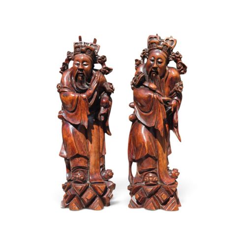 A Monumental and Exceptionally Rare Matched Pair of Chinese Carved Hardwood Figures of Daoist Immortals Qing Dynasty, Early 19th Century (Jiaqing Period, 1796–1820)