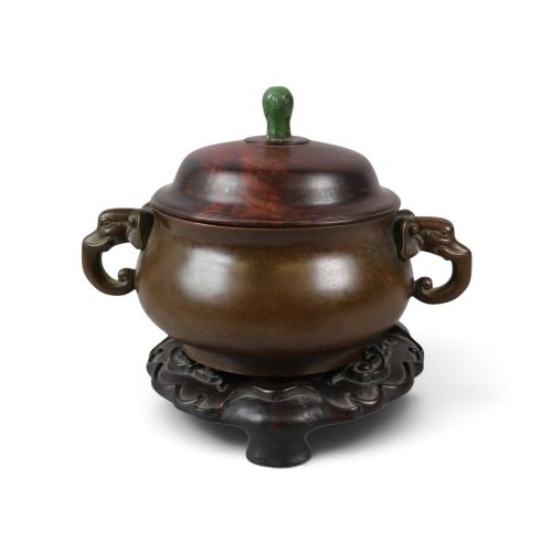 A Magnificent Chinese Archaistic Bronze Censer with Elephant-head Handles, Jade Finial, and Custom Hardwood Stand
