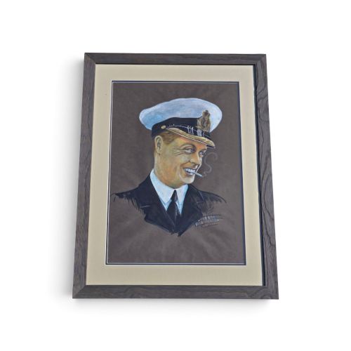 fig 1. A framed 1931 pastel portrait drawing depicting a smiling man in a naval uniform smoking a cigarette against a dark background within a double mount and dark wood frame.
