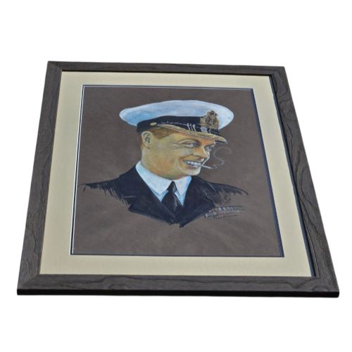 fig 2. A framed 1931 pastel portrait drawing depicting a smiling man in a naval uniform smoking a cigarette against a dark background within a double mount and dark wood frame.