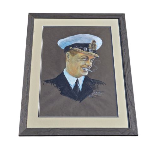 fig 3. A framed 1931 pastel portrait drawing depicting a smiling man in a naval uniform smoking a cigarette against a dark background within a double mount and dark wood frame.