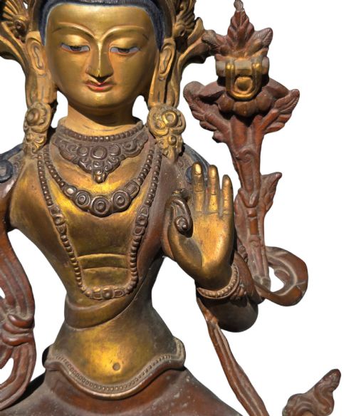 fig 10. An antique Sino-Tibetan gilt-bronze figure of Bodhisattva Manjushri seated cross-legged on a double-lotus base, brandishing a flaming sword in his right hand.