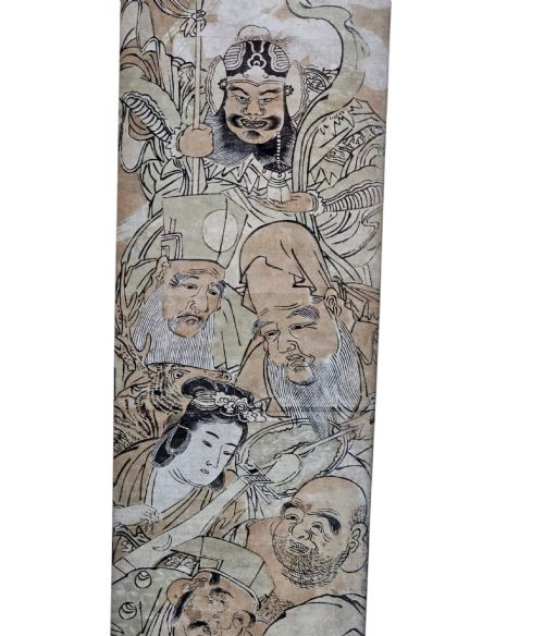fig 2. A tall framed Japanese ukiyo-e woodblock print depicting seven figures aboard a vessel beneath a flying crane, presented in a gold frame with a wide cream mount.