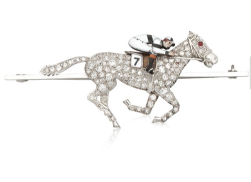 A Magnificent Mid-20th Century Circa 1940 Platinum-topped 18ct Gold Diamond, Enamel, and Ruby Equestrian Racing Brooch, Retailed by Garrard & Co.
