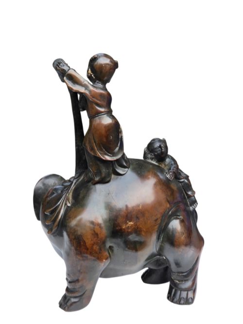fig 1. A dark patinated bronze Chinese sculpture depicting two young boys washing a caparisoned elephant.