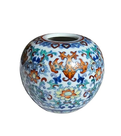 fig 5. A rounded Chinese porcelain water pot decorated in doucai enamels with lotus flowers, bats, and scrolling foliage.