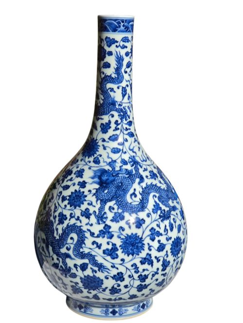 fig 2. A pear-shaped Chinese porcelain bottle vase decorated with detailed underglaze cobalt blue five-clawed dragons amidst floral scrolls.