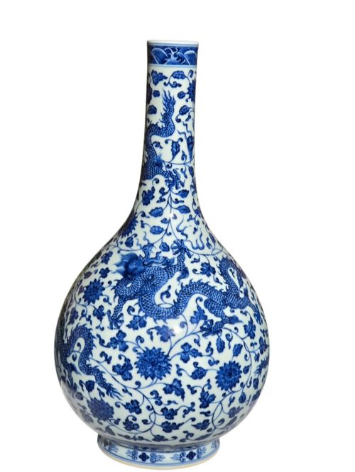 fig 3. A pear-shaped Chinese porcelain bottle vase decorated with detailed underglaze cobalt blue five-clawed dragons amidst floral scrolls.