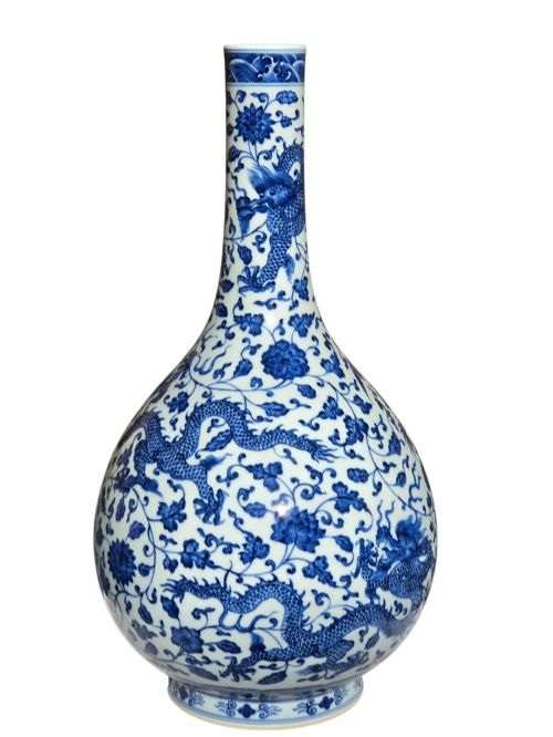 fig 5. A pear-shaped Chinese porcelain bottle vase decorated with detailed underglaze cobalt blue five-clawed dragons amidst floral scrolls.