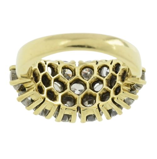 fig 2. An 18ct yellow gold dome cluster ring closely set with multiple round brilliant cut diamonds in claw settings.