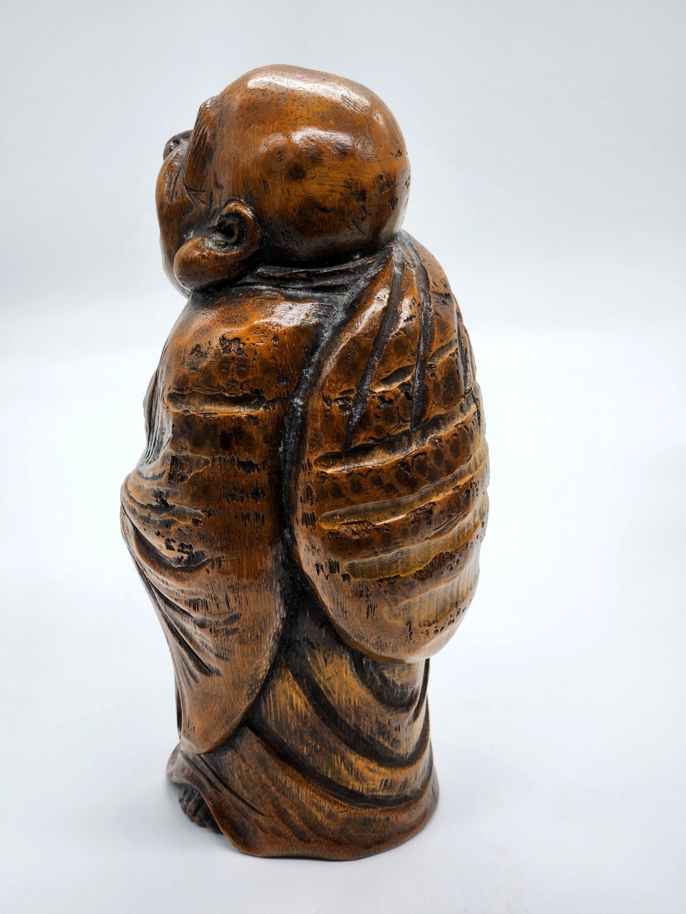 A Japanese Carved Wood Sculpture of Hotei Laughing Buddha View IX