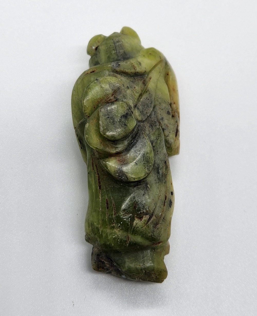 A Chinese Carved Green Jade Figure Ming Dynasty  View IV