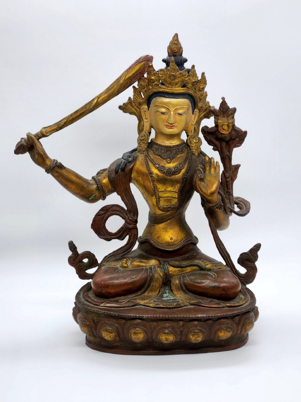 A Large Gilt Copper Alloy Figure of Manjushri, Sino-Tibetan, 19th century