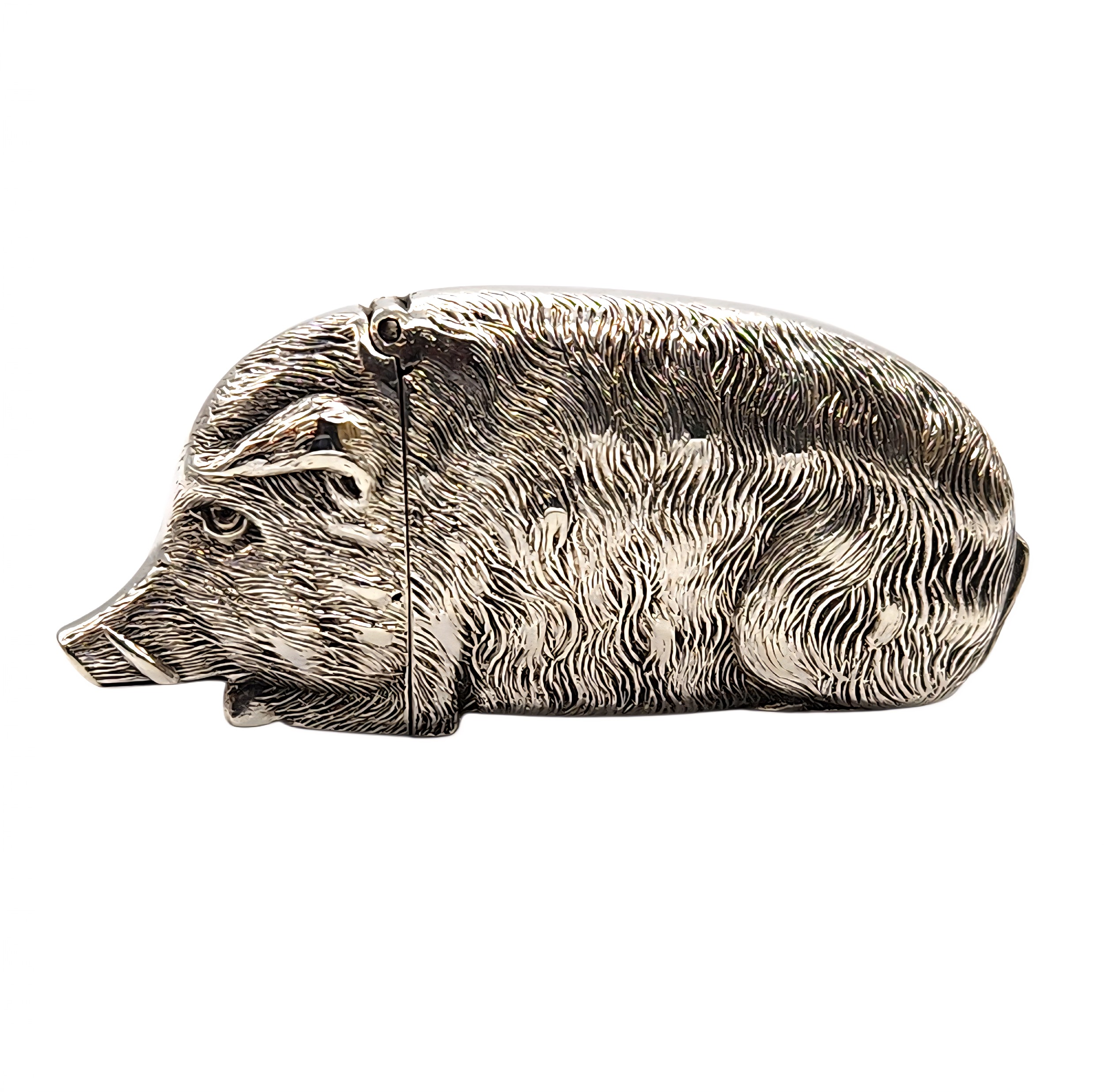 A Victorian silver novelty vesta case cast in the realistic form of a resting wild boar.