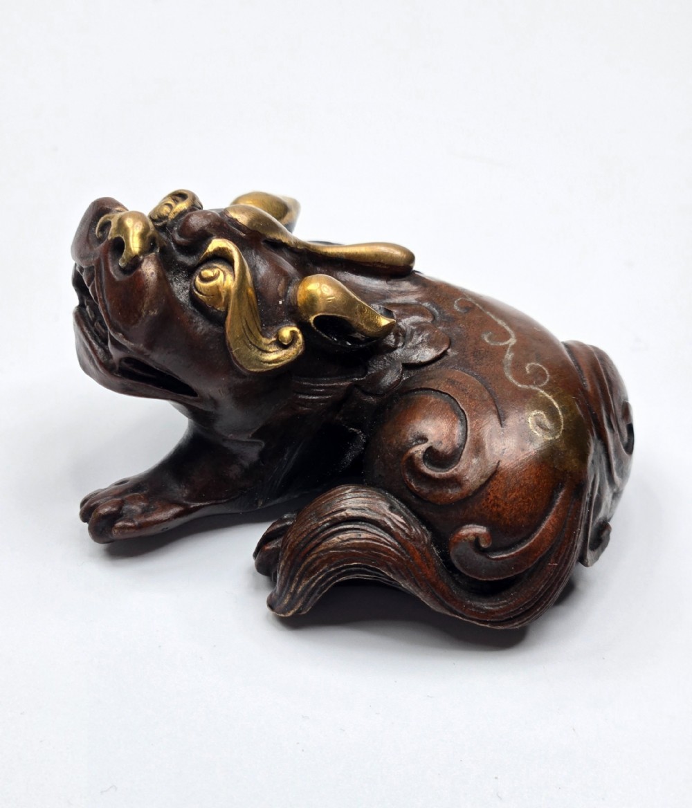 A Fine Chinese Bronze & Gold-Inlaid 'Bixie' Paperweight Qianlong Period (1736–1795) Circa 1760