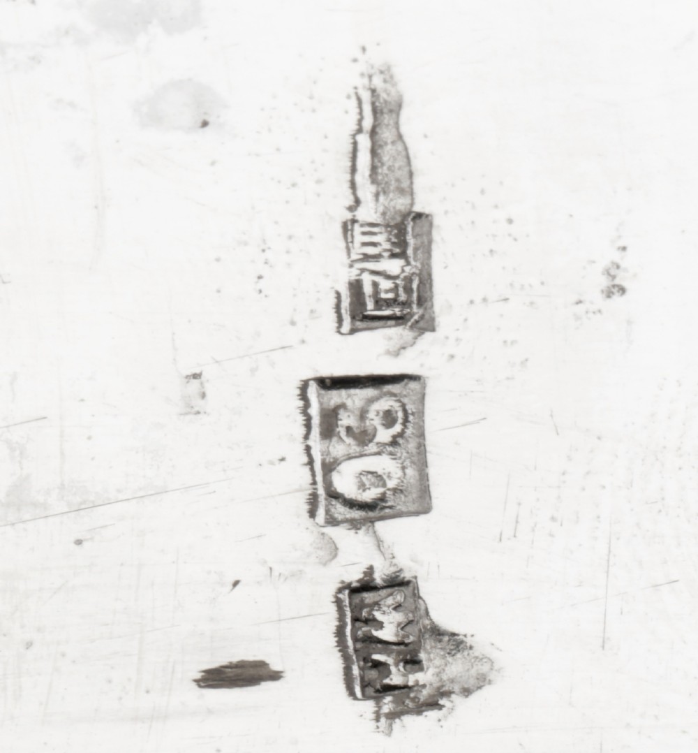 A rectangular silver box featuring detailed pierced openwork of two dragons amidst clouds around a central pearl. View VI