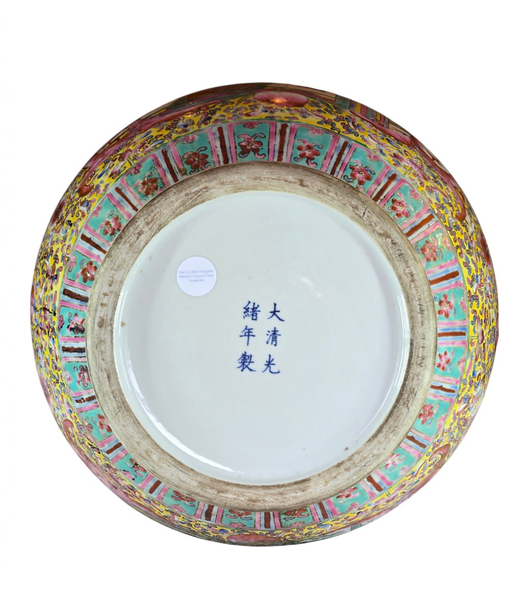 A monumental Chinese porcelain floor vase featuring a yellow ground with hand-painted polychrome enamel figural court scenes in central reserves and decorative handles. View III