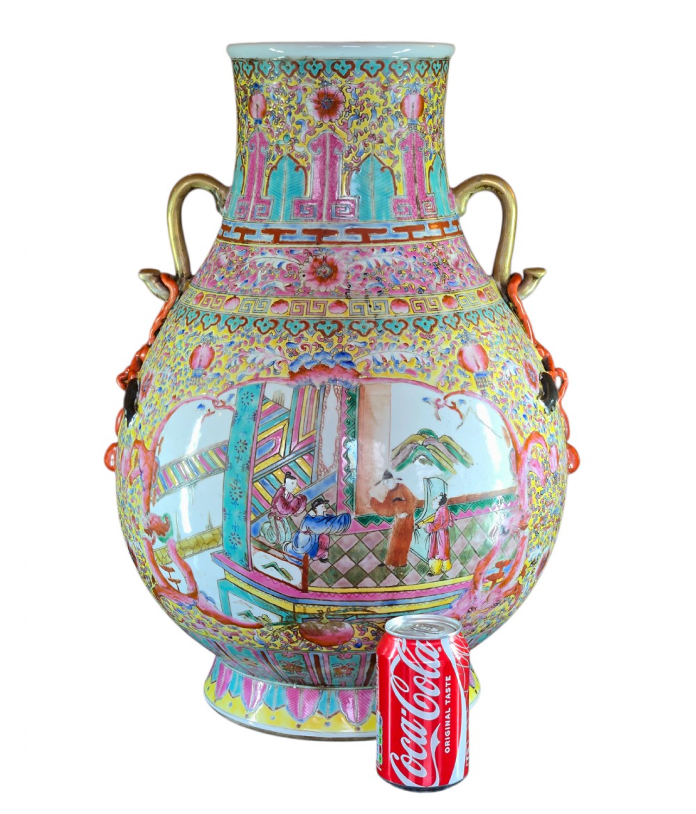 A monumental Chinese porcelain floor vase featuring a yellow ground with hand-painted polychrome enamel figural court scenes in central reserves and decorative handles. View IV