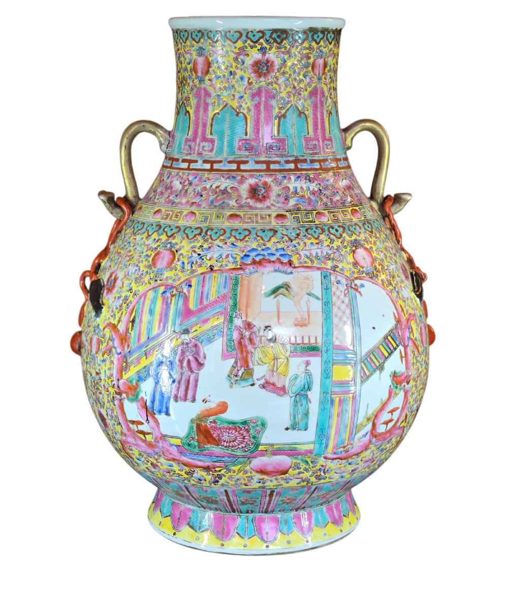 A monumental Chinese porcelain floor vase featuring a yellow ground with hand-painted polychrome enamel figural court scenes in central reserves and decorative handles. View X