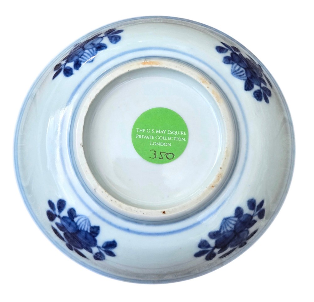 A circular Chinese blue and white porcelain deep saucer dish decorated with cobalt underglaze imagery of Shoulao, a crane, and character cartouches. View IX