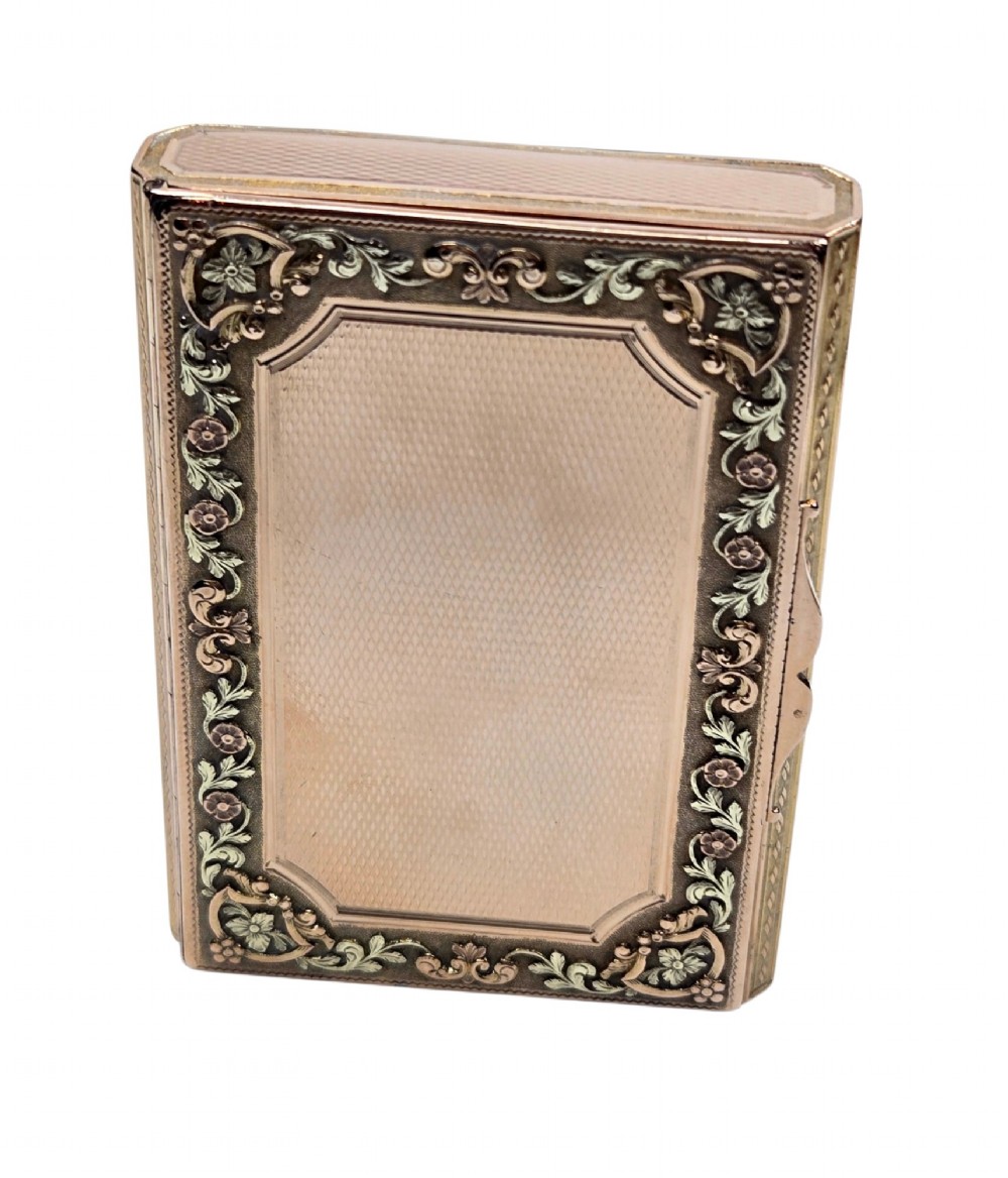 A rectangular 18K gold snuff box featuring engine-turned panels and chased floral relief borders in multi-toned gold. View XII