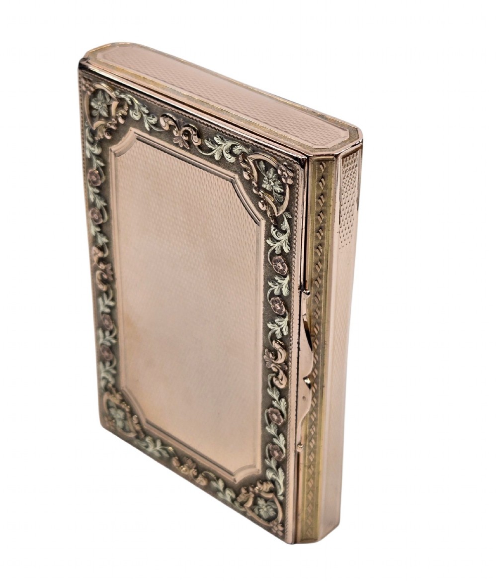 A rectangular 18K gold snuff box featuring engine-turned panels and chased floral relief borders in multi-toned gold. View XIII