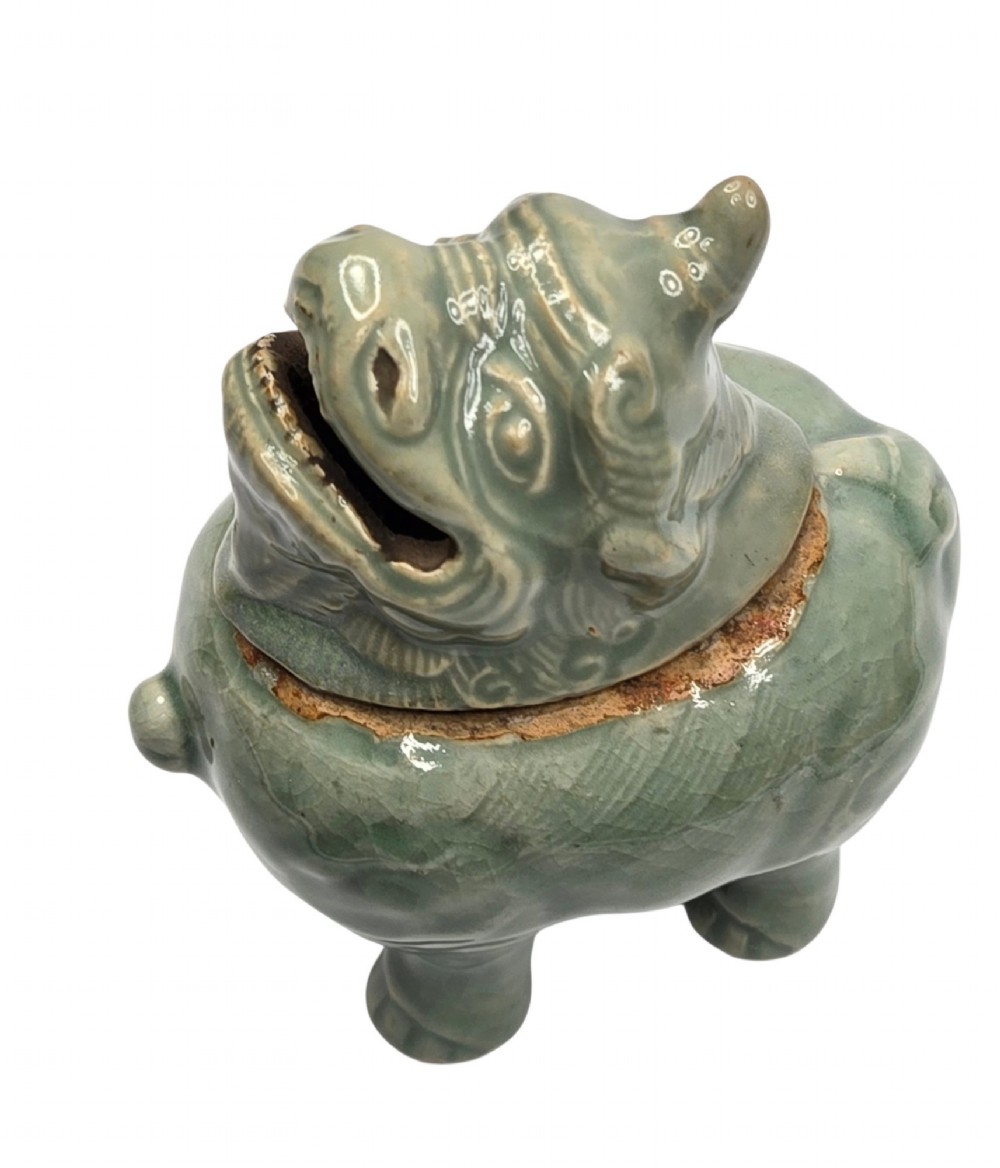 A celadon-glazed ceramic incense burner formed as a quadruped mythical creature with a removable head serving as the lid. View III