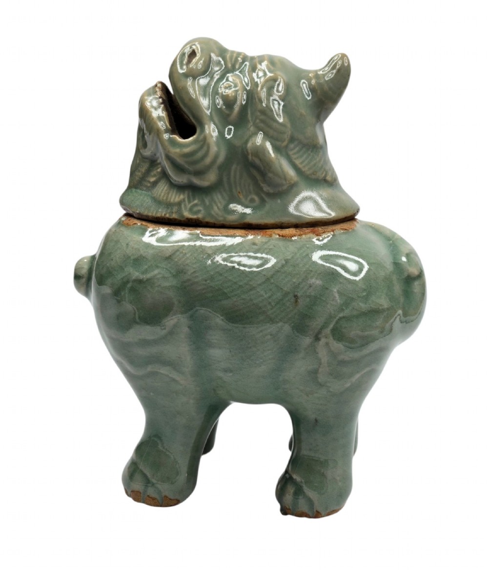 A celadon-glazed ceramic incense burner formed as a quadruped mythical creature with a removable head serving as the lid. View IV