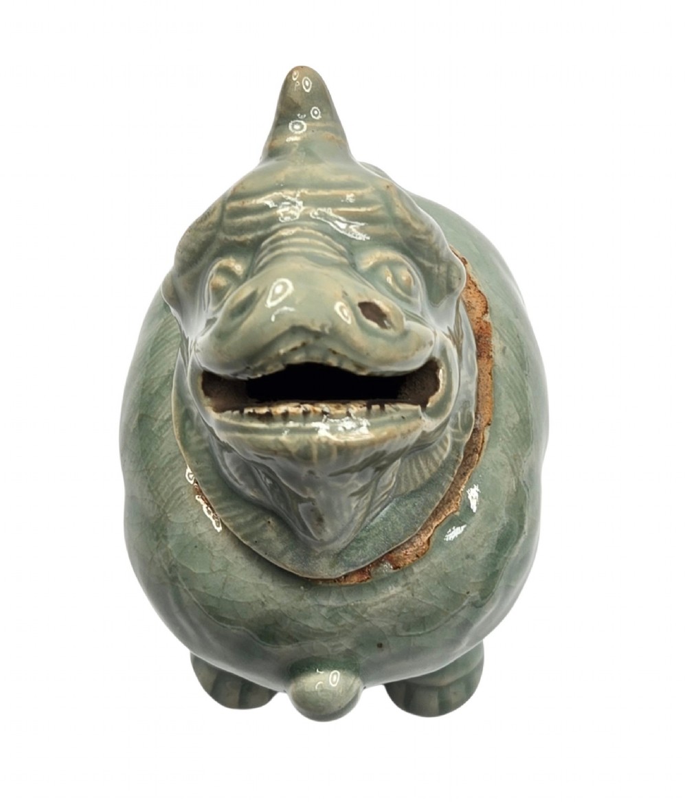 A celadon-glazed ceramic incense burner formed as a quadruped mythical creature with a removable head serving as the lid. View VII