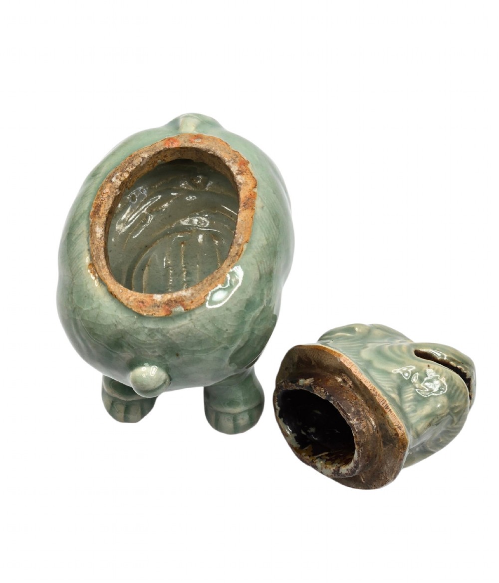 A celadon-glazed ceramic incense burner formed as a quadruped mythical creature with a removable head serving as the lid. View IX