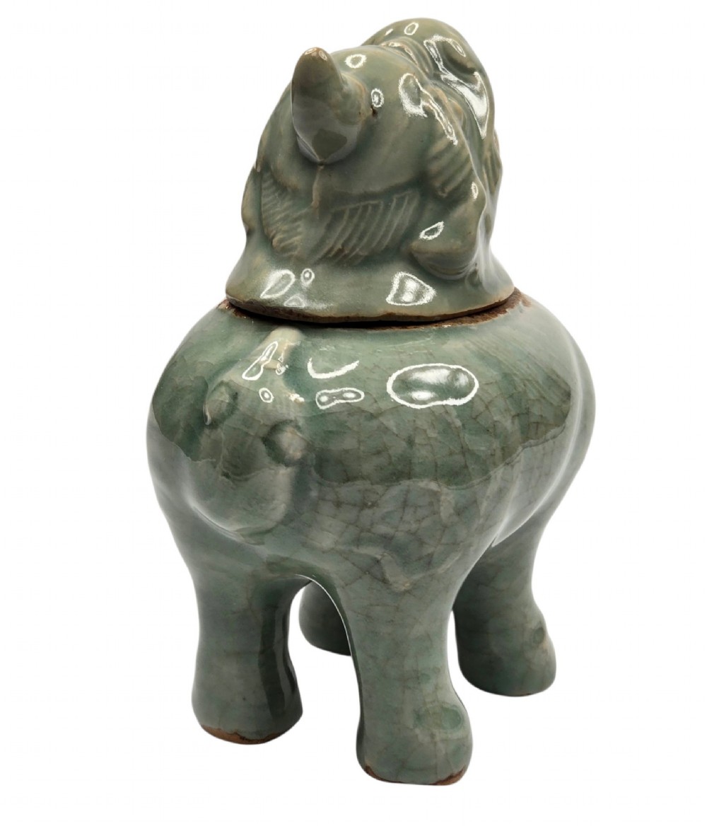 A celadon-glazed ceramic incense burner formed as a quadruped mythical creature with a removable head serving as the lid. View XI