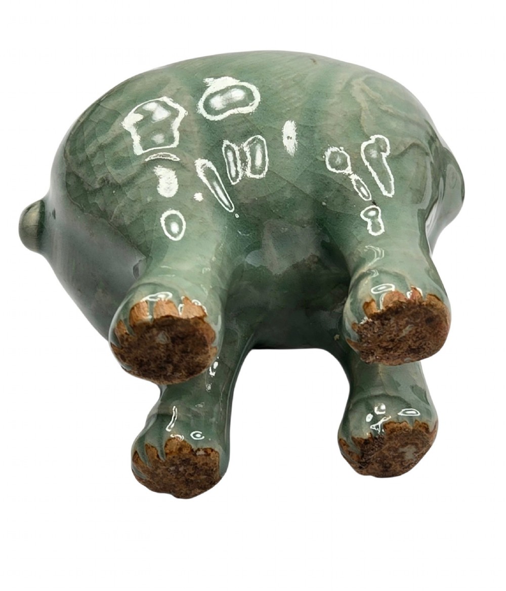 A celadon-glazed ceramic incense burner formed as a quadruped mythical creature with a removable head serving as the lid. View XII