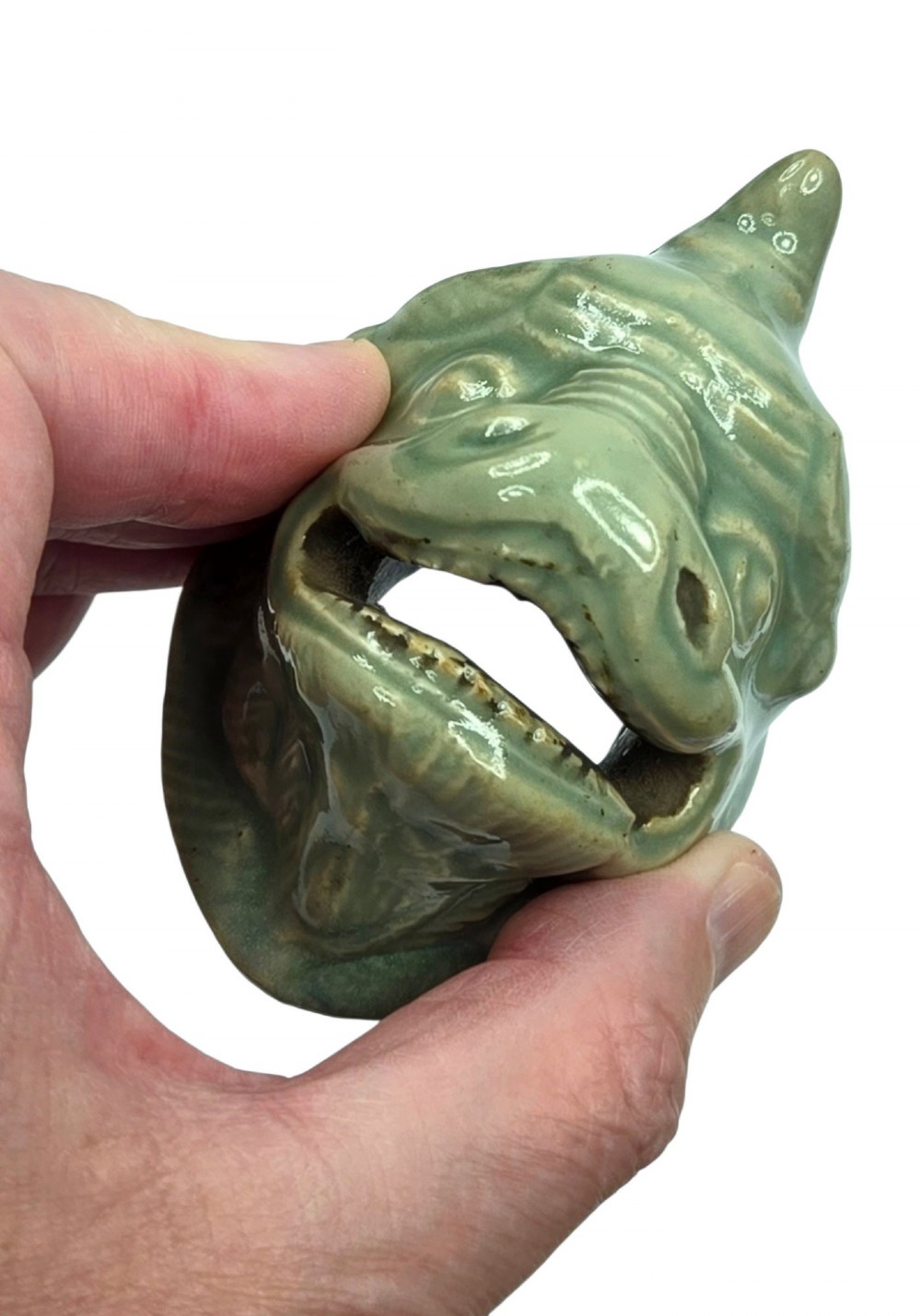 A celadon-glazed ceramic incense burner formed as a quadruped mythical creature with a removable head serving as the lid. View XV