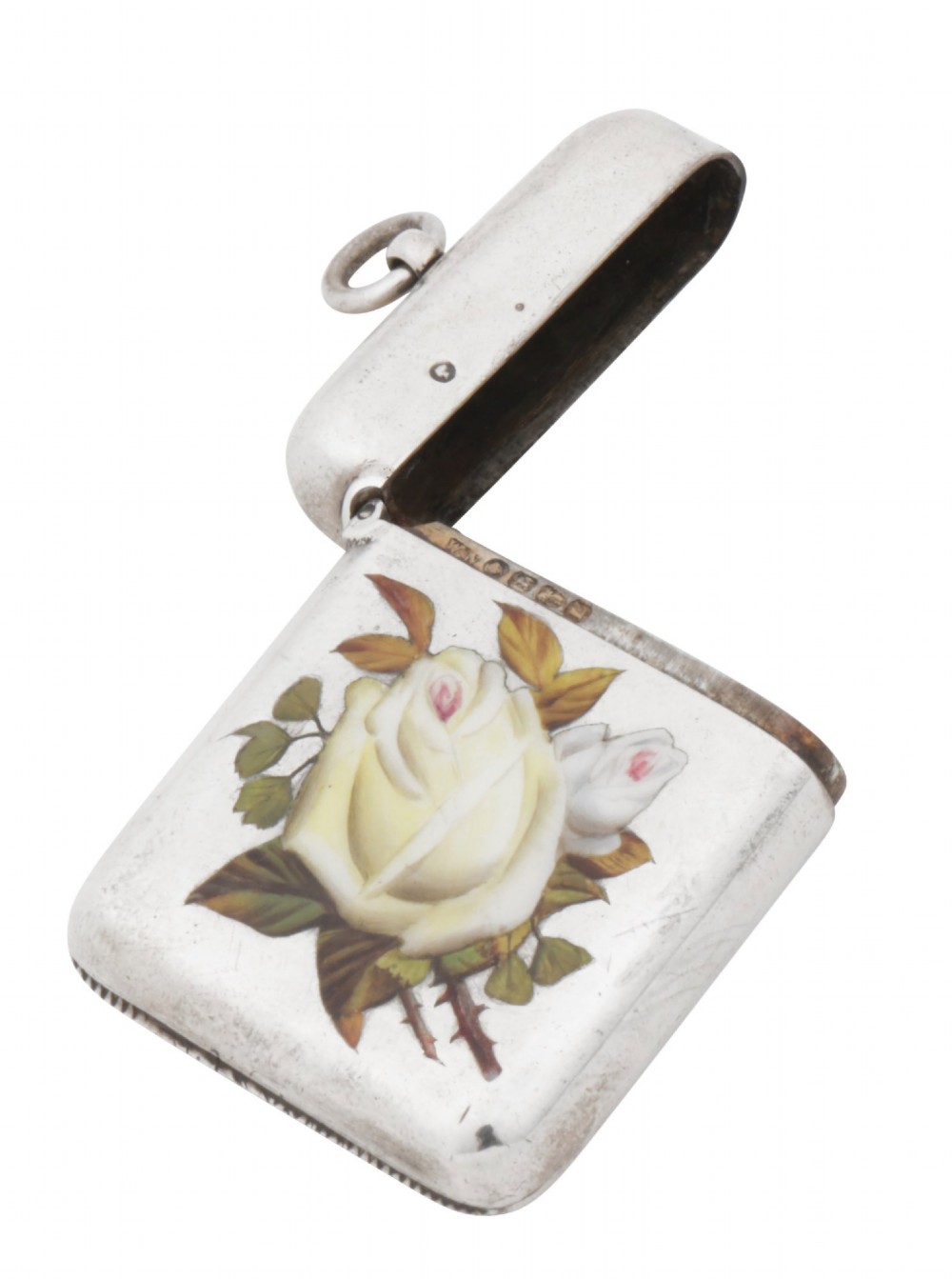 A rectangular sterling silver vesta case featuring hand-painted yellow and white roses in enamel with a top suspension loop. View VI