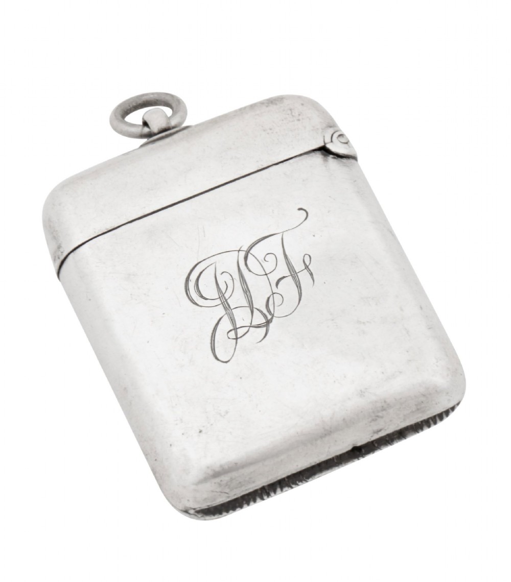 A rectangular sterling silver vesta case featuring hand-painted yellow and white roses in enamel with a top suspension loop. View VIII