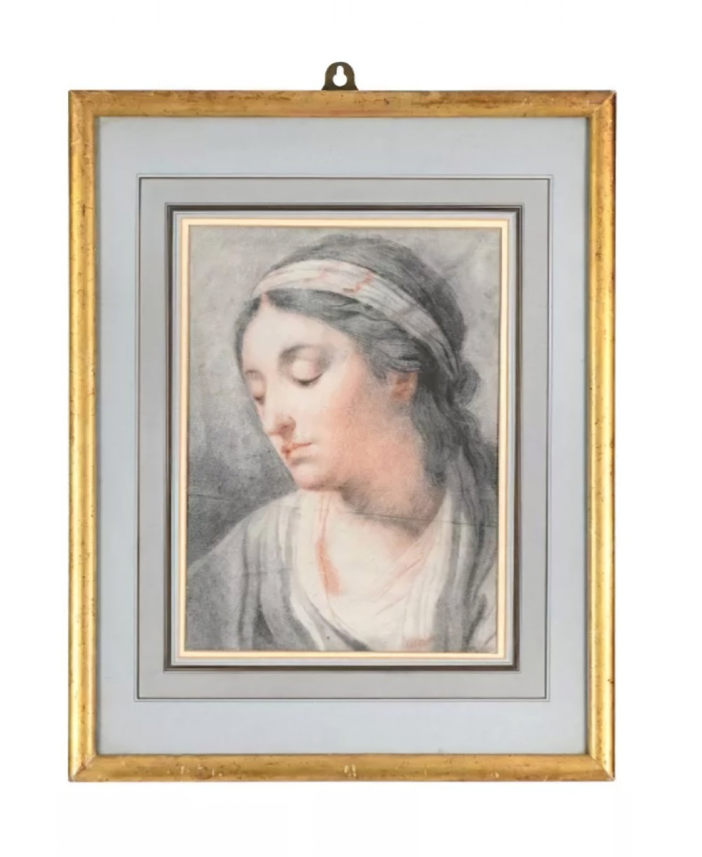 A chalk portrait drawing depicting the head and shoulders of a young woman wearing a patterned headband with her head tilted downwards. View III