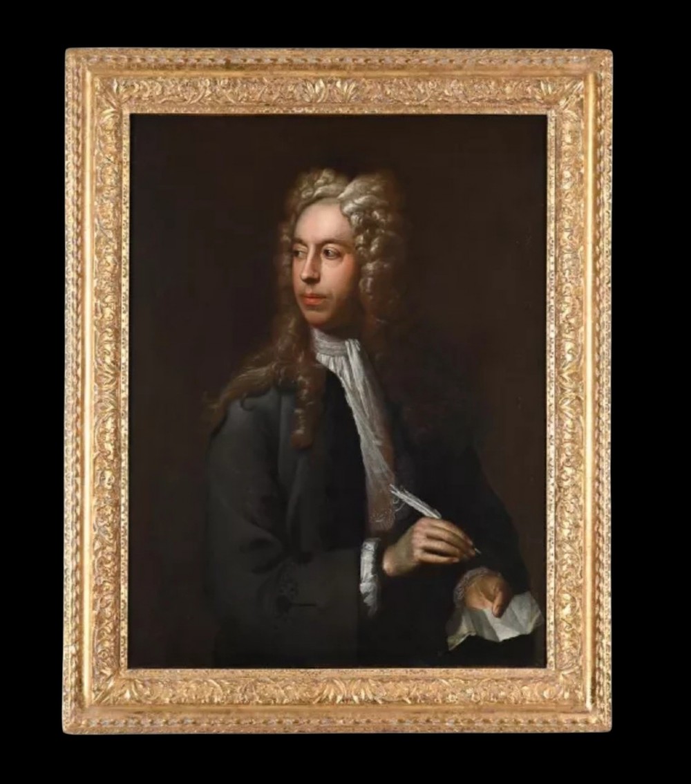 An eighteenth-century oil painting depicting a gentleman scholar with a long wig and quill pen, set within an ornate gilded frame. View X