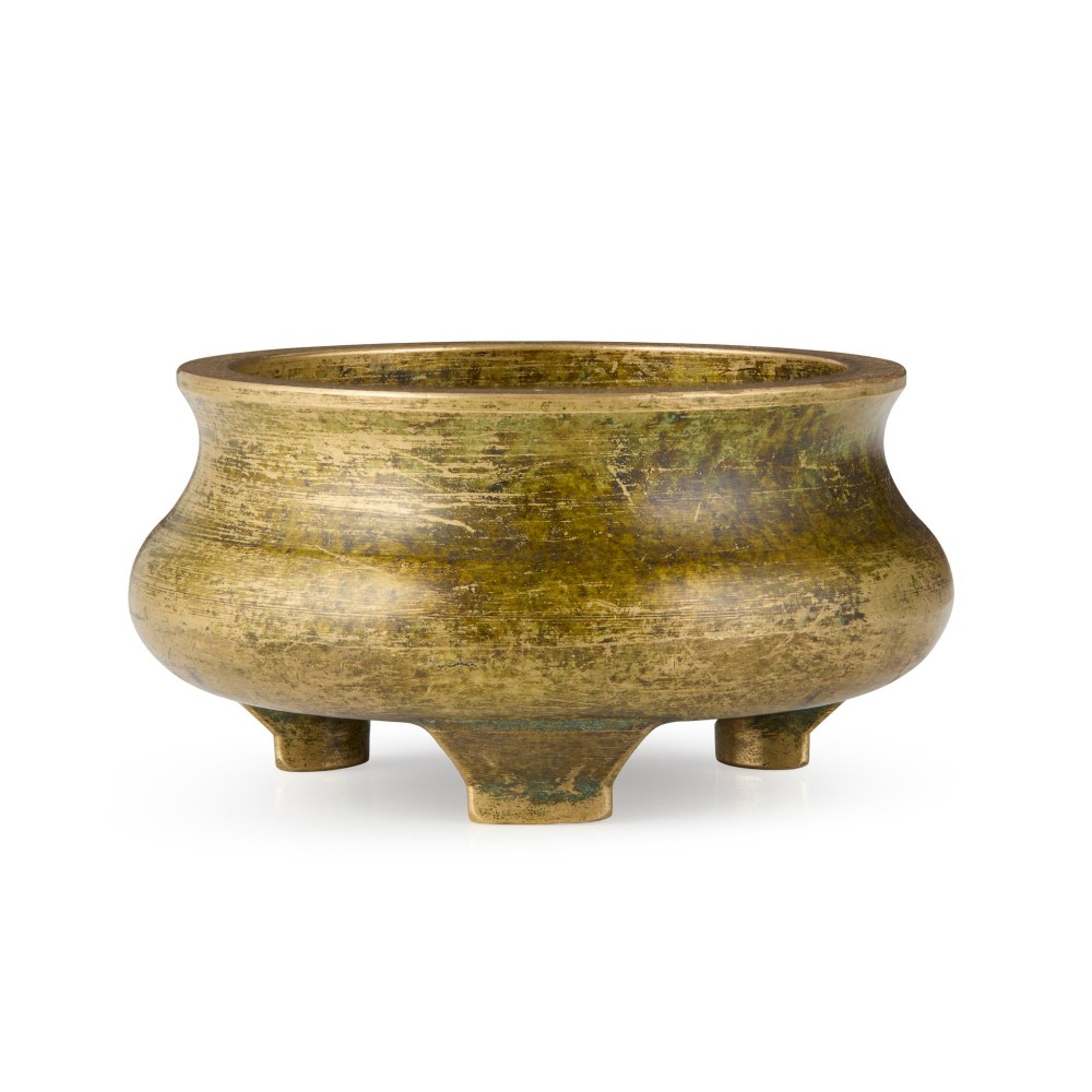 Underside view of a heavy bronze tripod censer displaying three short feet and a square recessed seal mark filled with turquoise oxidisation. View II