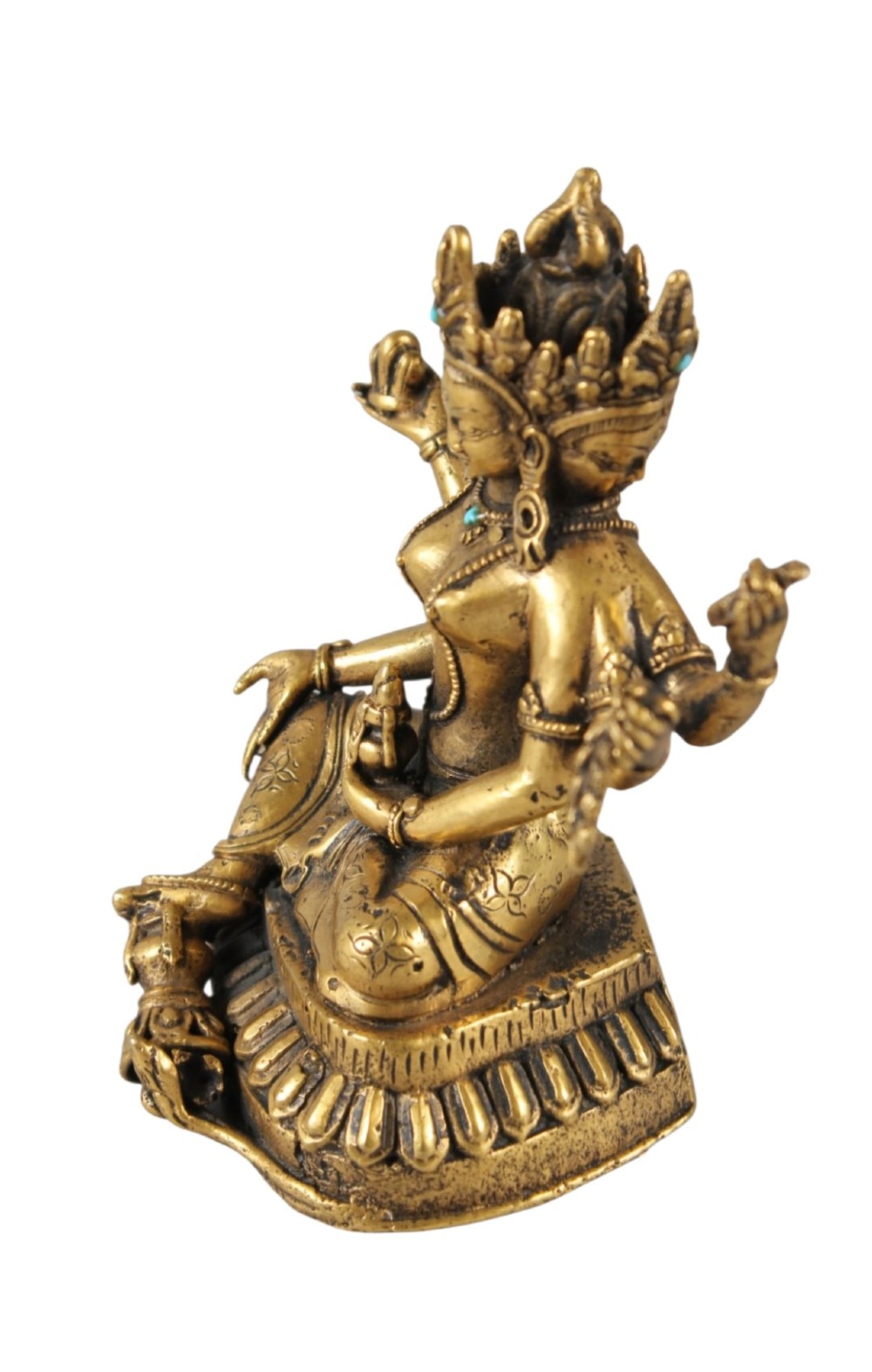 An early 19th-century gilt bronze multi-armed deity figure seated on a lotus base with turquoise stone inlays in the crown. View VIII