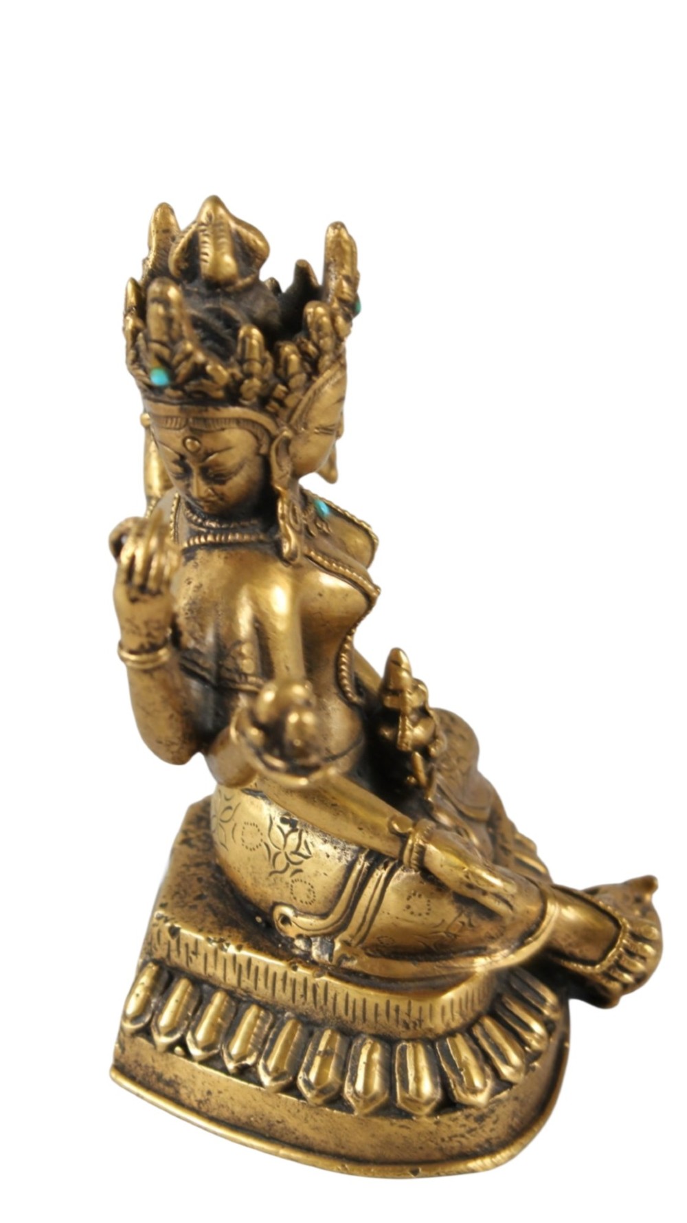 An early 19th-century gilt bronze multi-armed deity figure seated on a lotus base with turquoise stone inlays in the crown. View X
