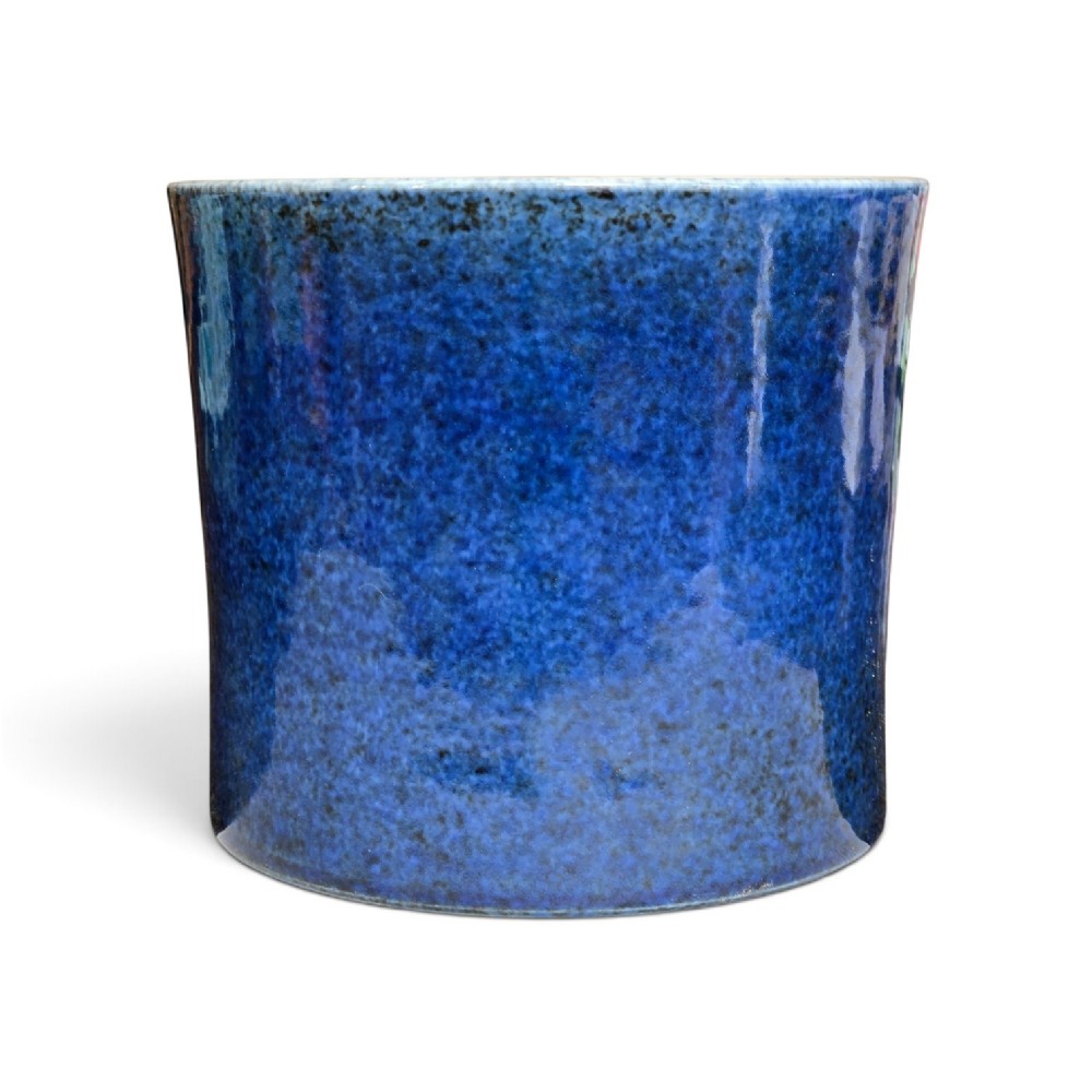 A cylindrical Chinese porcelain brush pot featuring a mottled powder-blue glaze with a pale rim. View II