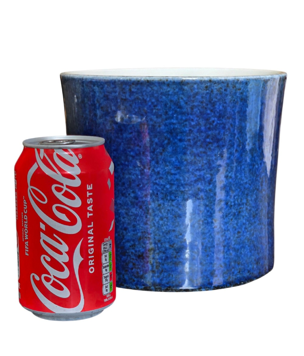 A cylindrical Chinese porcelain brush pot featuring a mottled powder-blue glaze with a pale rim. View III